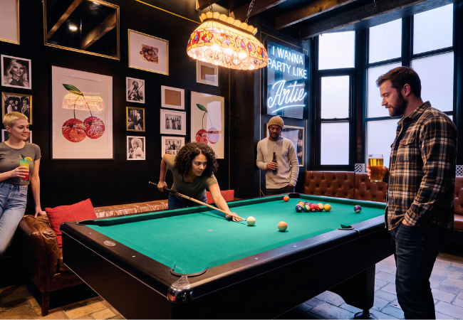 Friends playing pool